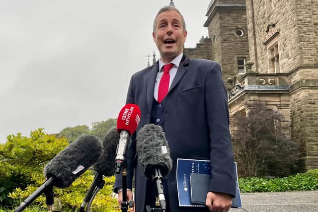 Democratic Unionist Party (DUP) Assembly member Paul Givan speaking outside Stormont Castle.