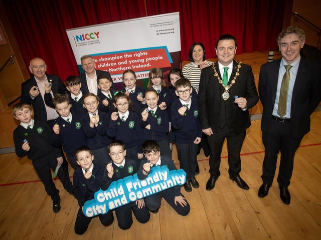 Primary 7 pupils at St. Patrick's Primary School, Derry pictured showing off their new badges at Wednesday's launch of the Pioneering Children's Rights and Wellbeing Programme across Derry and Strabane. Included at back are Tom Cassidy, Western Trust, Chris Quinn, Children's Commissioner,  Clare Maguire, DCSDC, the Mayor, Ruairi McHugh and Mr. Ian Gallagher, Principal. (Photos: Jim McCafferty Photography) : Children’s rights and wellbeing programme.