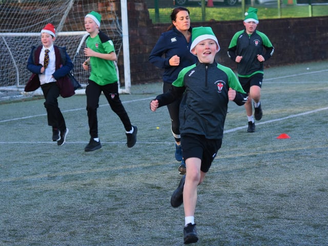 St. Joseph's students Shane, Brandon and Rory enjoying Tuesday's Santa's Run.