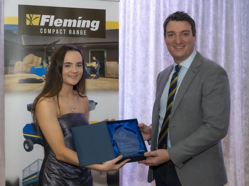 Lucy McGranaghan of Sion Mills/Strabane receives 2023 Women's 'Young Player of the Year' award from Peter McCartney, NW Cricket General Manager.