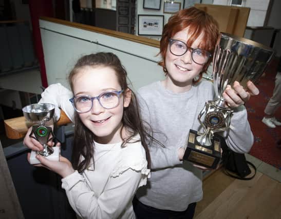 Fiann Mullin with sister Radha pictured with their awards on Saturday.