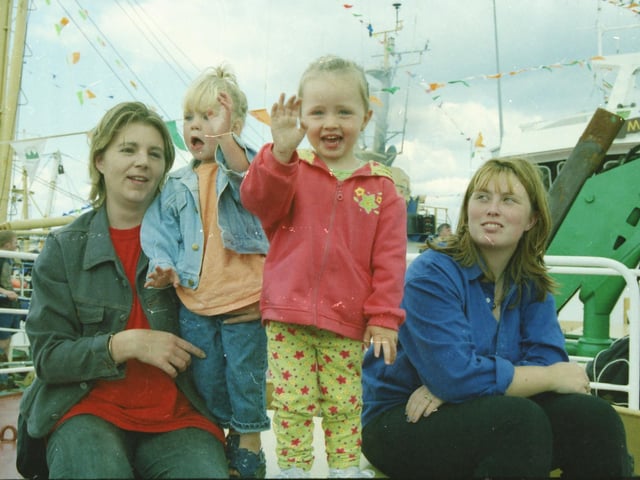 ALL ABOARD! A happy crew at the Blessing of the Fleet in Greencastle.