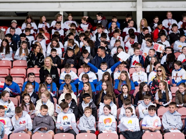 Participants at the Derry Diocese Fan The Flame annual Mass 2025 in Celtic Park.