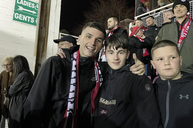 These young Derry City fans in the main stand at Richmond Park like what they see.