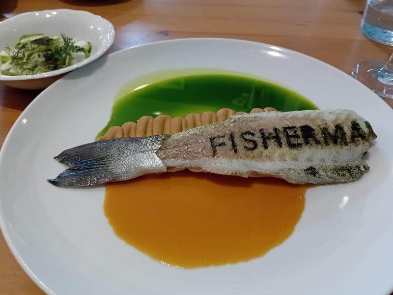 Seabass, cucumber salad, fish demi-glace sauce and parsley root puree from Fisherman in Sopot.