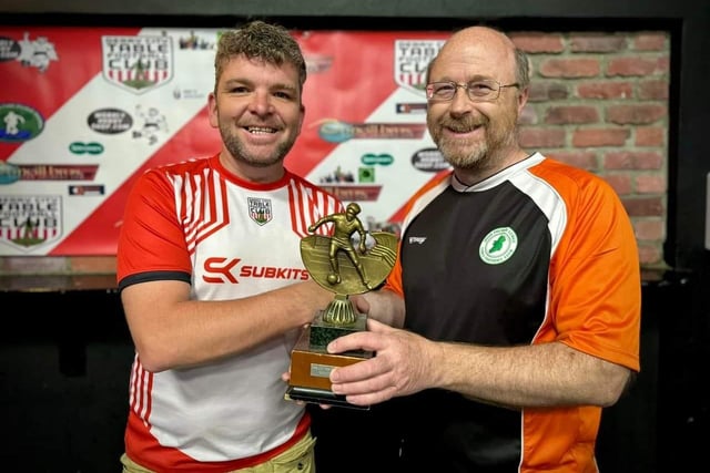 Lawrence Watson, Derry City Table Football Club, presenting the Jimmy Watson Memorial Cup to Kenny Beggs.