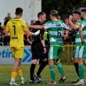 Shamrock Rovers players remonstrate with referee Damien McGraith after he awarded Derry City a late penalty. Photograph: George Sweeney