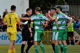 Shamrock Rovers players remonstrate with referee Damien McGraith after he awarded Derry City a late penalty. Photograph: George Sweeney