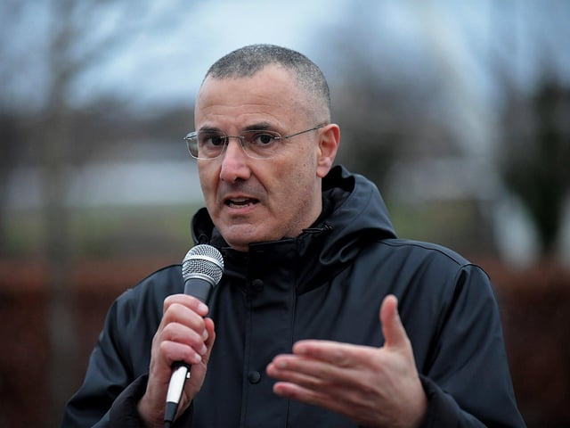 Omar Barghouti, founding committee member of Palestine Campaign for the Academic and Cultural Boycott of Israel speaking at the Holocaust Memorial Day vigil for Gaza, held in the Peace Garden, on Saturday afternoon. Photo: George Sweeney