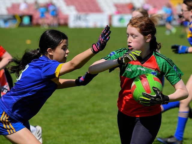 Derry Primary Schools Girls Finals at Celtic Park: Chapel Road PS and St Therese PS in action. Photo: George Sweeney.