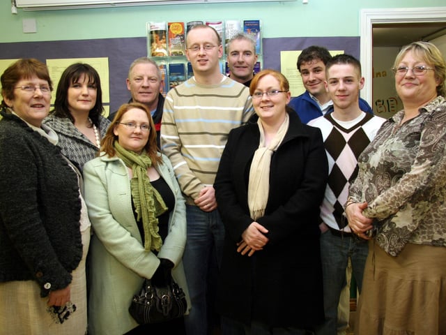 Staff members, Carmel, Gemma, Mary, Danny, Briege, Tom, John, Peter and Yvonne pictured with John at his leaving party 0014JML : Parties and celebrations March 2006: John Leonard.