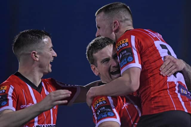 Patrick McEleney and Ciaran Coll celebrate with goalscorer Ben Doherty at the start of the second half in Oriel Park, Dundalk. Photograph by Ciaran Culligan.