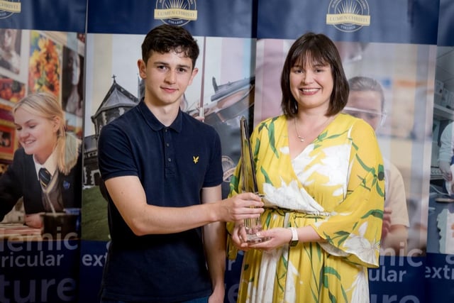 The DuPont Award for Chemistry is presented to Edan Bradley by Mrs Lynsey Campbell, (Head of Chemistry).