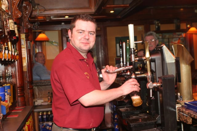 Serving pints at The Loft in 2004.