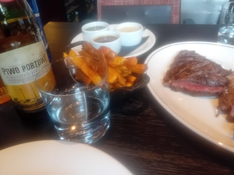 A serving of dry aged Polish rib-eye steak and USA Prime Black Angus rib eye steak from Butchery & Wine in Gdynia.