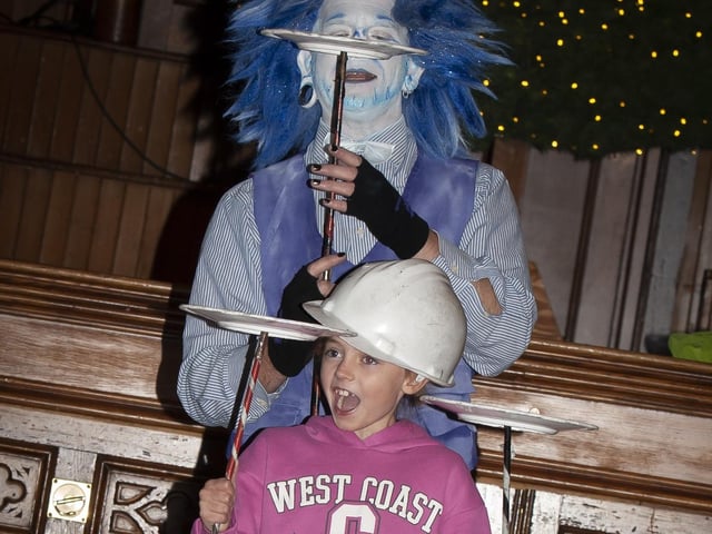 I DID IT!. . . .This young lady surprised at she's managed to spin some plates during Saturday's event in the Guildhall.:.