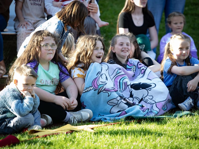 The smiling faces enjoying the Circada Circus performance at Abercorn Park on Tuesday evening. The event was part of Féile 24. (Photos: JIm McCafferty Photography)