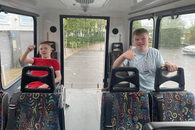 Matthew Friel and Kealan Doherty on a bus hired by Spraoi agus Sport.