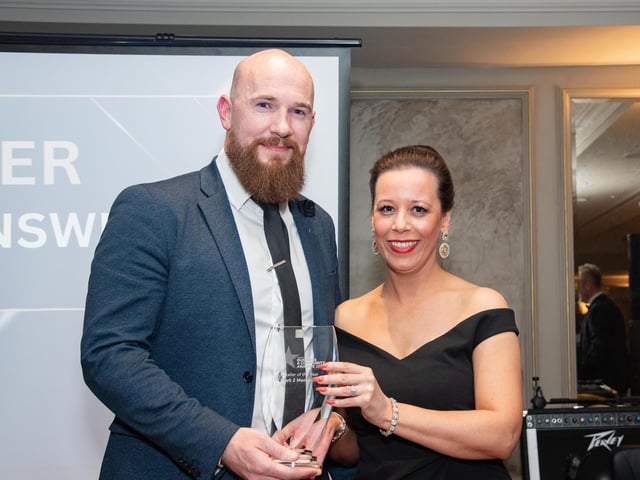 Bryan McCandless, Mark2 Menswear collects the Retailer of the Year Award sponsored by Bank of Ireland from Louise McDermott, Bank of Ireland at the Carndonagh Traders Business and Community Awards in the Ballyliffin Lodge Hotel on Saturday night last. Photo Clive Wasson.