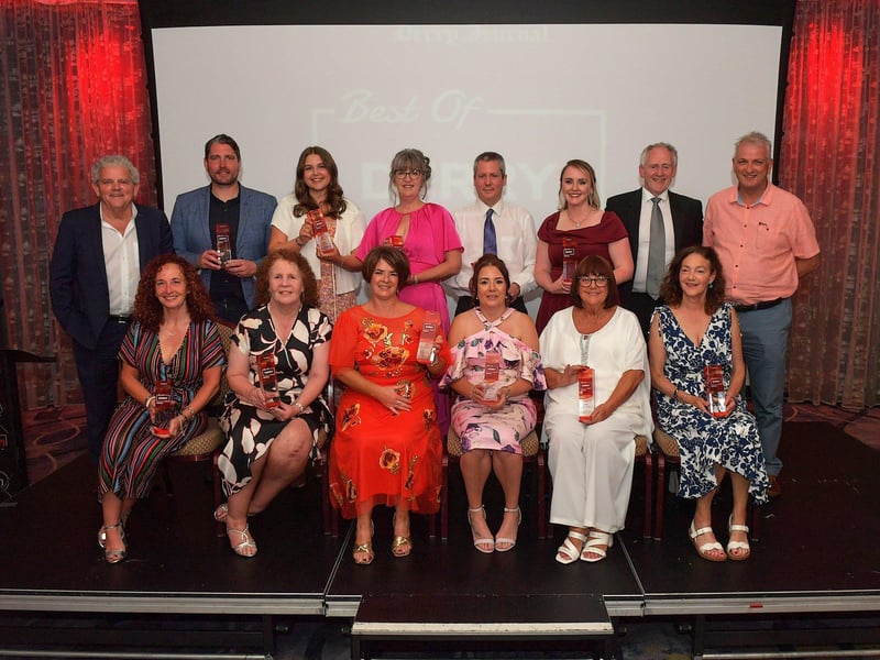 Derry Journal Best of Derry BetMcLean Award winners pictured with principal sponsor Paul McLean and compere Adrian Logan. Photo: George Sweeney. DER2325GS – 59