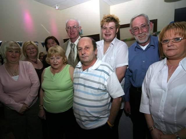 The Hasson family join in the birthday celebrates with charles at The Tree Flowers 0003/JML : Parties and celebrations January 2006: Charles Conaghan.