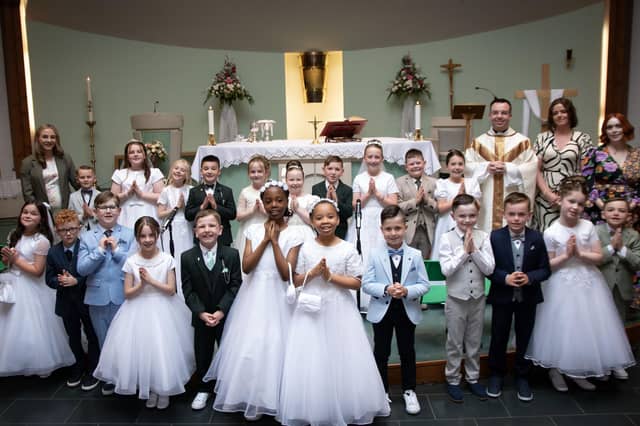 Pupils from Sacred Heart Primary School, Waterside, who received the Sacrament of First Holy Communion from Fr. Patrick Lagan at Sacred Heart Church on Friday last. (Photo: Kerrie Quinn)
