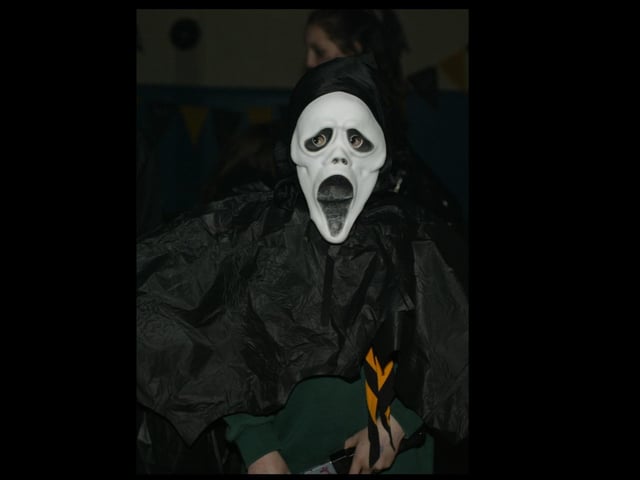 Young people boogying at a Halloween Disco in 2003