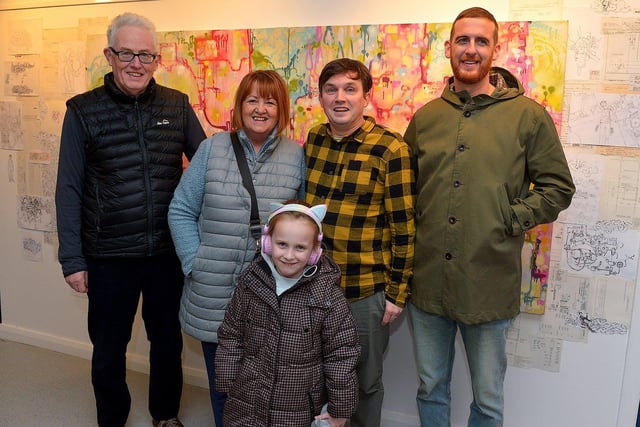Street Artist and illustrator Elph One aka Brian McFeely pictured relatives Conal McFeely, Anne McFeely, Anna McFeely and Caolan McFeely at the launch of his  ‘Doodles in Derry’ exhibition on Saturday in the UV Arts ‘The Urban Art Gallery’ in Bishop Street.  Photo: George Sweeney. DER2301GS – 56
