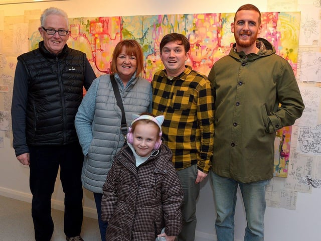 Street Artist and illustrator Elph One aka Brian McFeely pictured relatives Conal McFeely, Anne McFeely, Anna McFeely and Caolan McFeely at the launch of his ‘Doodles in Derry’ exhibition on Saturday in the UV Arts ‘The Urban Art Gallery’ in Bishop Street. Photo: George Sweeney. DER2301GS – 56