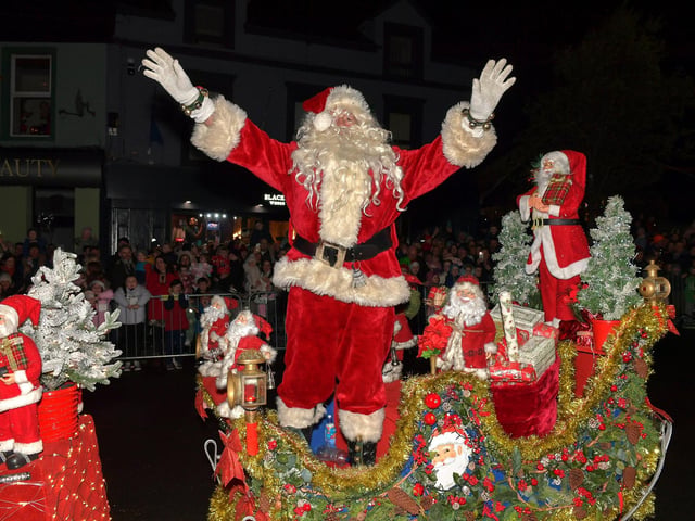 Santa arrived in Buncrana on Friday evening to meet the children and toswitch on the Christmas tree lights switch in Market Square. Photo: George Sweeney