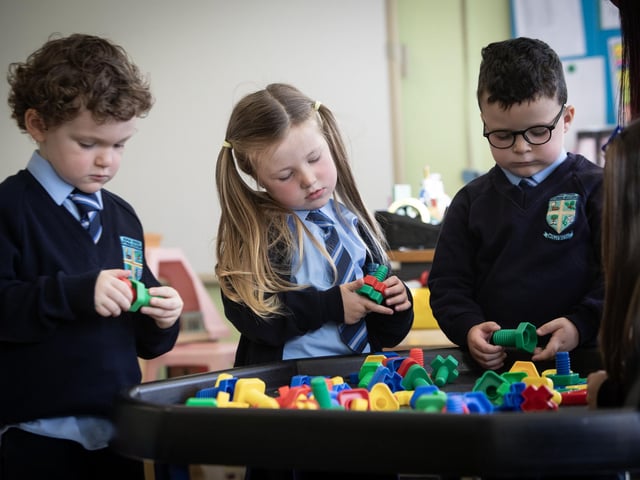 Primary 1 pupils hard at play in Hollybush PS this week. (Photos: Jim McCafferty Photography)