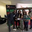 From left: Ken Odumukwu, his wife Adamma and their two sons Daniel and David with North West Migrants Forum Director Lilian Seenoi Barr and volunteer Seun Awonuga preparing for this Saturday’s Black History Summit, being held as part of Black History Month.