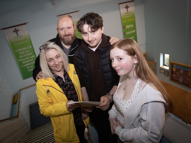 A very happy A Level student Dylan McKinney pictured with his family at St. Joseph's on Thursday morning. (Photos: Jim McCafferty Photography)