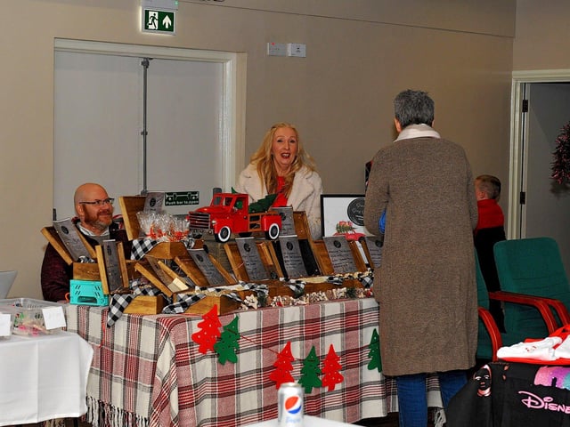 Stall holders at the Galliagh Community Response Christmas Craft Fair held in Pio House Parish Centre on Saturday, in aid of Foyle Down Syndrome Trust. Photo: George Sweeney. DER2250GS – 86
