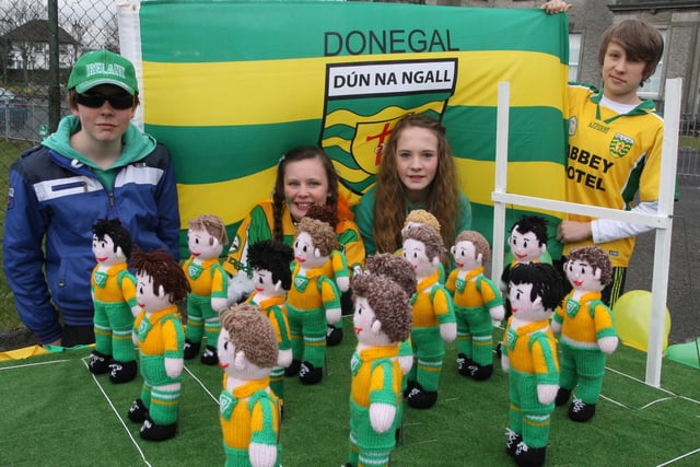 UP DONEGAL!. . . One of the floats at Sunday's St. Patrick's Day parade in Buncrana, with from left, Eoin Kelly, Rachel Devlin, Andrea Kelly and Conor Devlin. 1903JM13