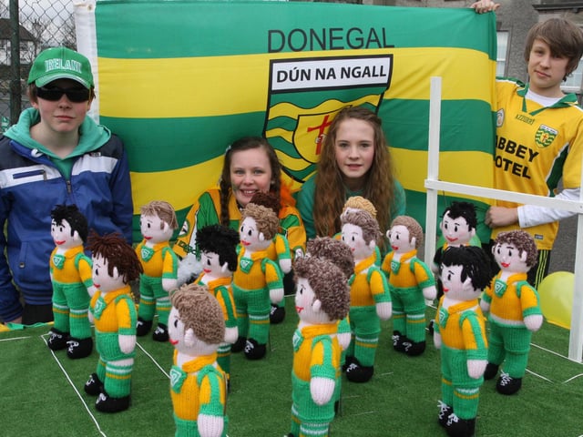 UP DONEGAL!. . . One of the floats at Sunday's St. Patrick's Day parade in Buncrana, with from left, Eoin Kelly, Rachel Devlin, Andrea Kelly and Conor Devlin. 1903JM13