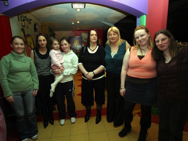 Charmaine, Fiona, Kirsty Lee, Linda, Bernie, Marion, Lisa, and Mary. 0018/JML : Parties across Derry in January 2006.