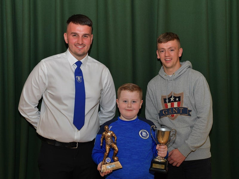 Trojans FC award winning player Connor Long pictured at the club’s annual prizegiving, alongside Diolain Ward Vice- Chairperson and Derry City’s Ciaron Harkin. Photo: George Sweeney