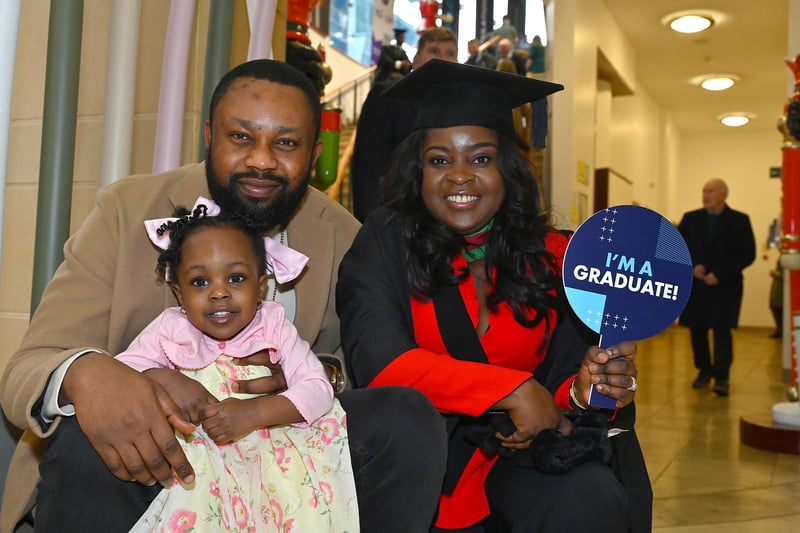 Shola Popoola from Nigeria graduating in MSc International Business pictured with partner Olaoluwa
and daughter Temitope. Picture By: Arthur Allison: PacemakerPress.