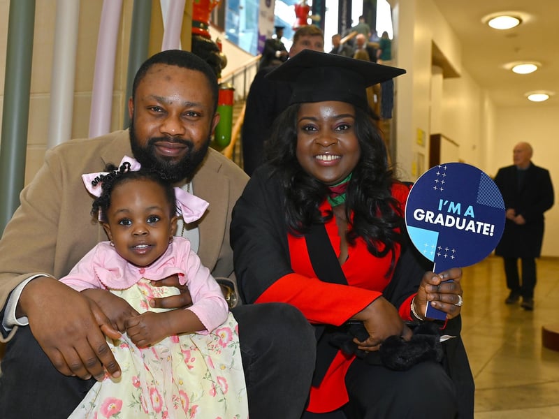 Shola Popoola from Nigeria graduating in MSc International Business pictured with partner Olaoluwa
and daughter Temitope. Picture By: Arthur Allison: PacemakerPress.