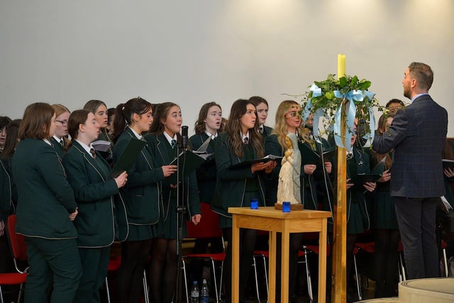 St Cecilia’s College choir sing during a Carol Service held in St Mary’s Church, Creggan, on Tuesday afternoon. Photo: George Sweeney. DER2251GS – 03