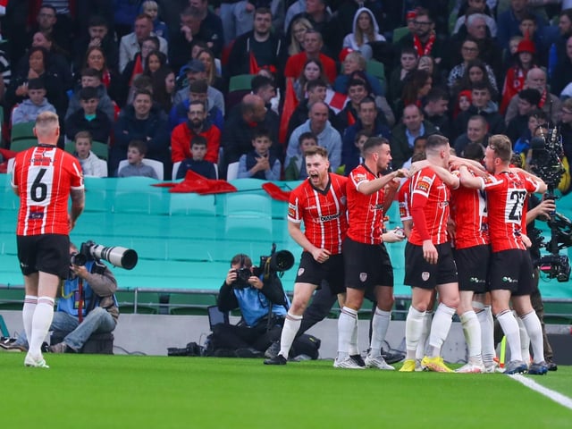 Derry City players mob Jamie McGonigle after the striker fired the Candystripes in front against Shelbourne in Sunday's FAI Cup Final in the Aviva Stadium. (Photo: Photo: Kevin Moore/MCI)