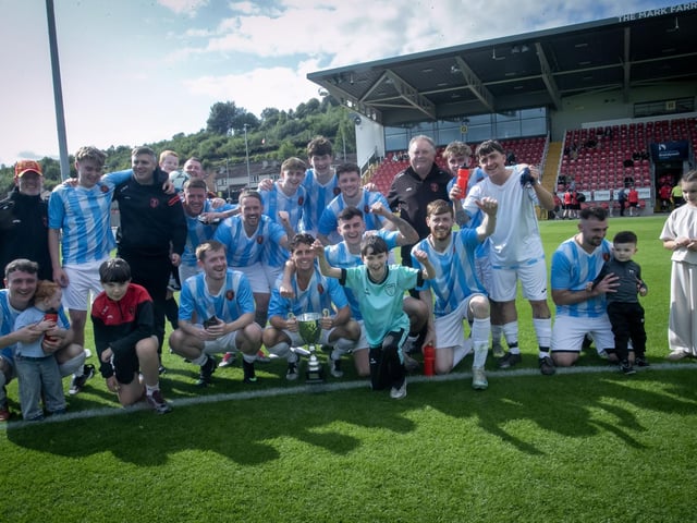 Phoenix Athletic players and officials celebrate Saturday's Jimbo Crossan Cup victory over Tristar at the Brandywell. (Photos: Jim McCafferty Photography)