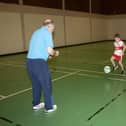 Young footballers show off their skills to coach Sean Davis at Templemore.
