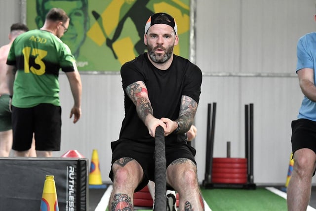 A competitor pulls the sled at Aodhán’s Hyrox, in aid of Foyle Search and Rescue, at Na Magha on Sunday. Photo: George Sweeney