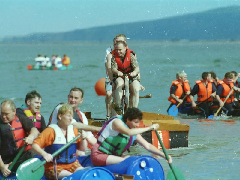 Crews compete in the Moville raft race.