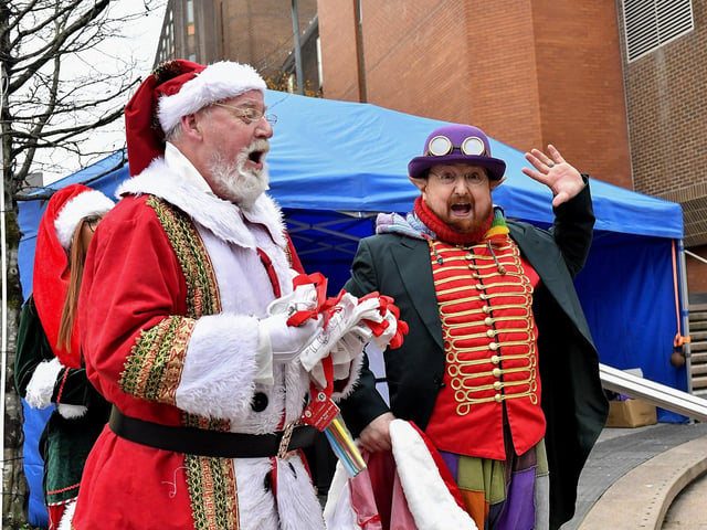 Santa arrives at the Richmond Shopping Centre on Sunday afternoon. Photo: George Sweeney