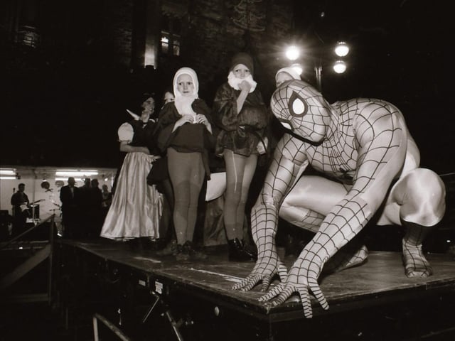 Crowds watch as Mayor and Mayoress of Derry, John and Carita Kerr switch on the Christmas lights with a little help from Spider Man and the Power Rangers.
