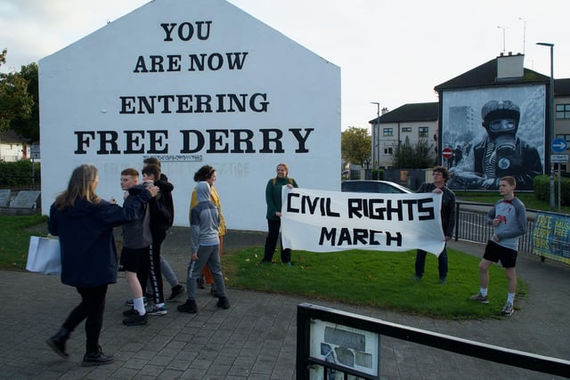 Youths gather at Free Derry Corner.