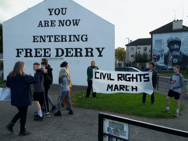 Youths gather at Free Derry Corner.